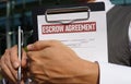 Escrow agreement is shown using the text Royalty Free Stock Photo