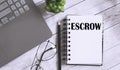 ESCROW text on the notebook with office background Royalty Free Stock Photo