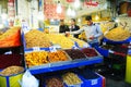 Man trades traditional Iranian nuts and dried fruits. Royalty Free Stock Photo