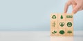 ESG concept of environmental, social and governance. Sustainable corporation development. Hand holds wooden cubes with Royalty Free Stock Photo