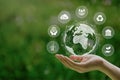 ESG icon concept in the woman hand for environmental, social, and governance by using technology of renewable resources to reduce