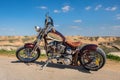 Custom Chopper motorcycle on desert and blue sky background Royalty Free Stock Photo