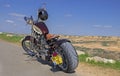 Custom Chopper motorcycle on desert and blue sky background Royalty Free Stock Photo