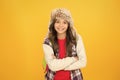 Eskimo smiling schoolgirl long hair soft hat enjoy softness. Winter season concept. Warm hat for cold weather. Kid girl Royalty Free Stock Photo