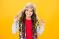 Eskimo style. Soft furry accessory. Child schoolgirl long hair soft hat enjoy softness. Winter season concept. Warm hat Royalty Free Stock Photo