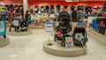 Eskisehir, Turkey - April 08, 2017: Female shopper, baby car seat and baby chair sections in a supermarket in Eskisehir