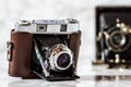 Antique Camera with Leather Holster on Marble Background