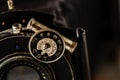 Antique Folding Camera on Marble Background Royalty Free Stock Photo