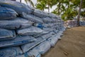 Esmeraldas, Ecuador - March 16, 2016: Sandbags to protect against the flood by tsunami in Same Beach, Casablanca