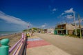 Esmeraldas, Ecuador - March 16, 2016: Stoned pavement road in the coast, surrounded with abundat vegetation in a sunny