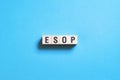 Esop - employee stock ownership plan, word concept on cubes Royalty Free Stock Photo