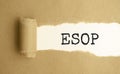 ESOP, text on white paper on torn paper background Royalty Free Stock Photo