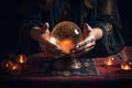 esoteric and astrology concept, Crystal ball in fortune teller hands Royalty Free Stock Photo