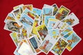 Esoteric background of scattered tarot cards close up