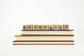 Esperanto language word on wood stamps and books Royalty Free Stock Photo