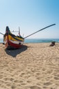 ESPINHO, PORTUGAL - JULY 16, 2017: Arte Xavega typical portuguese old fishing boat on the beach in Paramos, Portugal. Royalty Free Stock Photo