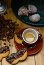 Espresso with carnival cookies and stuffed tortelli