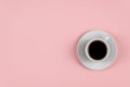 Espresso coffee against a pink background. White cup and saucer. Hot drink. Copy space for text and design elements Royalty Free Stock Photo