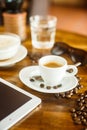 Espresso , coffee beans , water and porridge Royalty Free Stock Photo