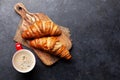 Espresso coffee and croissants for breakfast Royalty Free Stock Photo