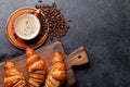 Espresso coffee and croissants for breakfast Royalty Free Stock Photo