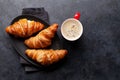 Espresso coffee and croissants for breakfast Royalty Free Stock Photo