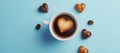 espresso coffee cup with love chocolate on blue background Royalty Free Stock Photo
