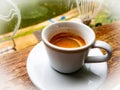 Espresso coffee, Cup of coffee on wood table. Traditional, heat. Royalty Free Stock Photo