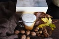 Espresso coffee in glass cup on autumn decorated desk