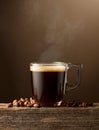 Espresso coffee glass cup on a brown background Royalty Free Stock Photo