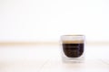 Espresso coffee in glass one single on table background Royalty Free Stock Photo