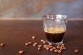 An espresso coffee shot on rustic table background. Royalty Free Stock Photo