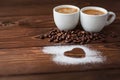Espresso coffee with sugar powdered heart