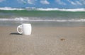 Espresso coffee in white cup with ocean Royalty Free Stock Photo