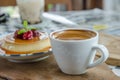 Espresso coffee in a white cup on the table. Royalty Free Stock Photo