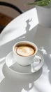 Espresso Coffee in White Cup on Table in Sunlight Royalty Free Stock Photo