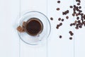 Espresso cup of coffee, sugar and beans Royalty Free Stock Photo