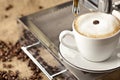 Espresso cup full with coffee beans Royalty Free Stock Photo