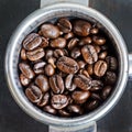 Espresso filter filled with coffee beans Royalty Free Stock Photo