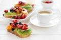 Espresso and fruit dessert sandwiches with ricotta cheese, kiwi, apricot, strawberry, blueberry and red currant Royalty Free Stock Photo