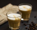 Espresso latte coffee glasses with milk foam and coffee beans ,