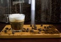 Espresso macchiato layer with a fresh coffee beans