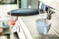 Espresso machine pouring coffee in cup Royalty Free Stock Photo