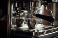 espresso machine pouring strong looking fresh coffee into a cup Royalty Free Stock Photo