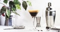 Espresso martini alcoholic cocktail with vodka, coffee liqueur, syrup and ice, white background, bar tools, copy space Royalty Free Stock Photo