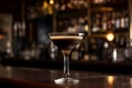 Espresso Martini Cocktail based on coffee, liqueur and vodka on a bar counter, copy space for text. Served in an elegant martini Royalty Free Stock Photo