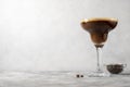 Espresso Martini cocktail drink. Alcohol cocktail with foam and coffee beans. Copy space for text Royalty Free Stock Photo