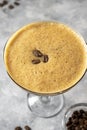 Espresso Martini cocktail drink. Alcohol cocktail with foam and coffee beans. Party drinks. Royalty Free Stock Photo