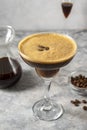 Espresso Martini cocktail drink. Alcohol cocktail with foam and coffee beans. Party drinks. Royalty Free Stock Photo