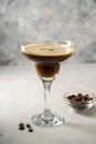 Espresso Martini cocktail drink. Alcohol cocktail with foam and coffee beans. Party drinks Royalty Free Stock Photo